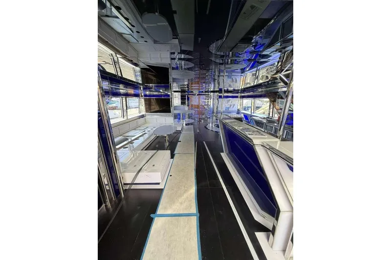 Slide: The Image of Luxurious interior of 1992 Heesen 141 Motor Yacht with modern design elements. - 86