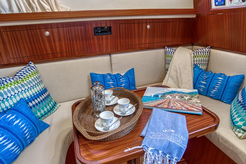 Slide: The Image of Cozy interior of 2020 Fratelli Aprea Sorrento 32 with cushions, tea set, and book. - 15