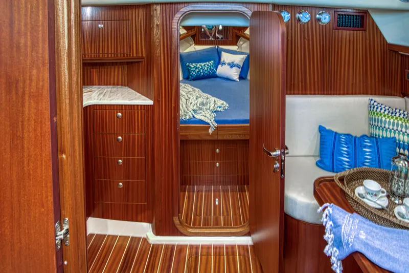 Slide: The Image of Luxurious 2020 Fratelli Aprea Sorrento 32 yacht interior with wood finish and cozy cabin. - 22