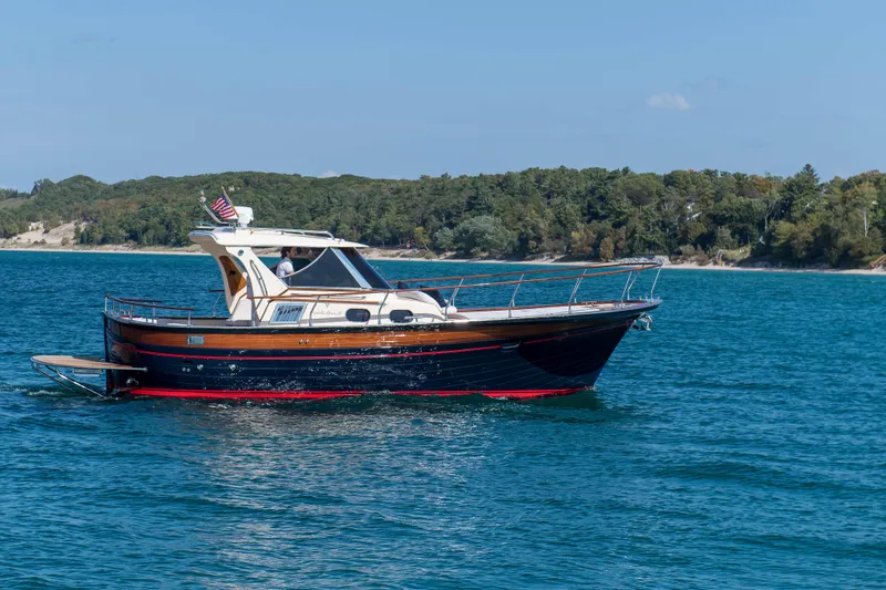 Slide: The Image of Fratelli Aprea Sorrento 32 boat cruising on blue water, 2020 model. - 28