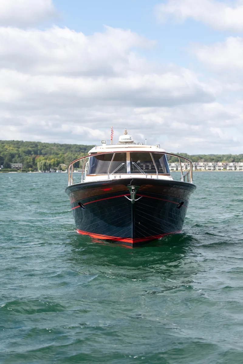 Slide: The Image of Fratelli Aprea Sorrento 32 boat on a lake, 2020 model, under a cloudy sky. - 3
