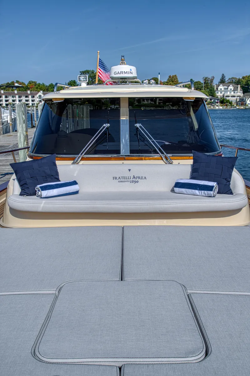 Slide: The Image of Fratelli Aprea Sorrento 32 yacht, 2020 model, docked with cushions and towels on deck. - 35