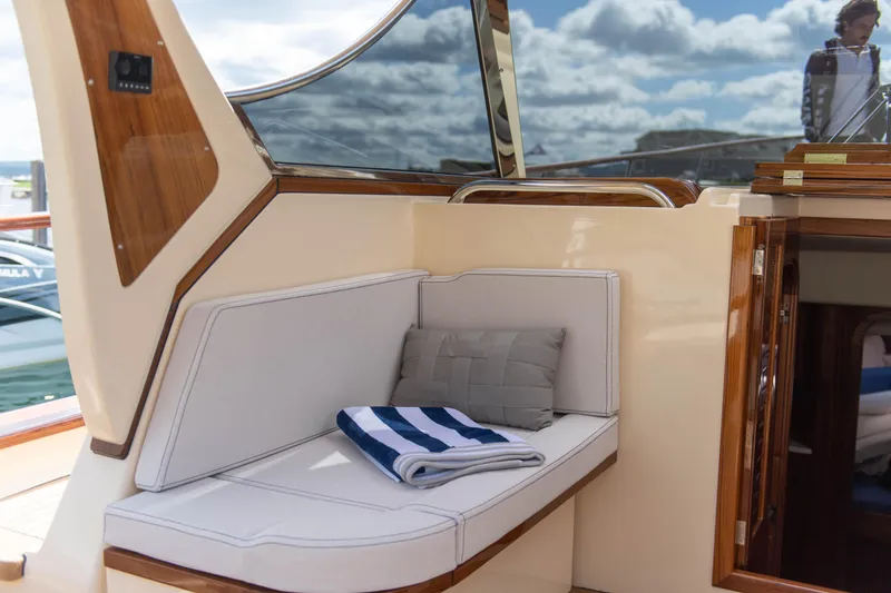 Slide: The Image of Fratelli Aprea Sorrento 32 yacht interior with cushioned seating, 2020 model. - 9