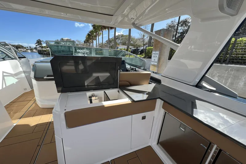 Slide: The Image of 2024 Aviara AV40 Outboard interior with sleek kitchen and modern design. - 10
