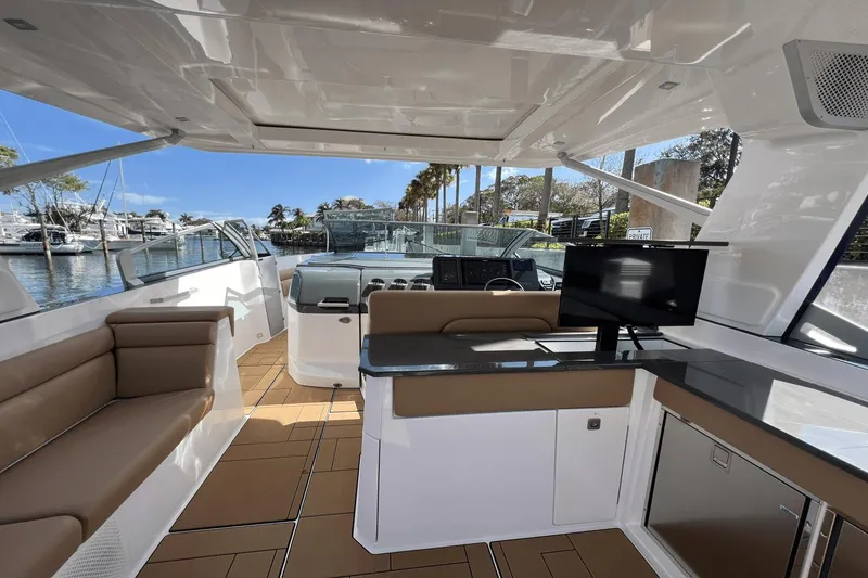 Slide: The Image of Luxurious 2024 Aviara AV40 Outboard interior with modern seating and sleek design. - 13