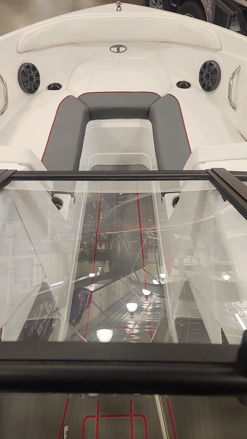 Slide: The Image of 2024 Tahoe 210 S boat interior with seating and speakers. - 4