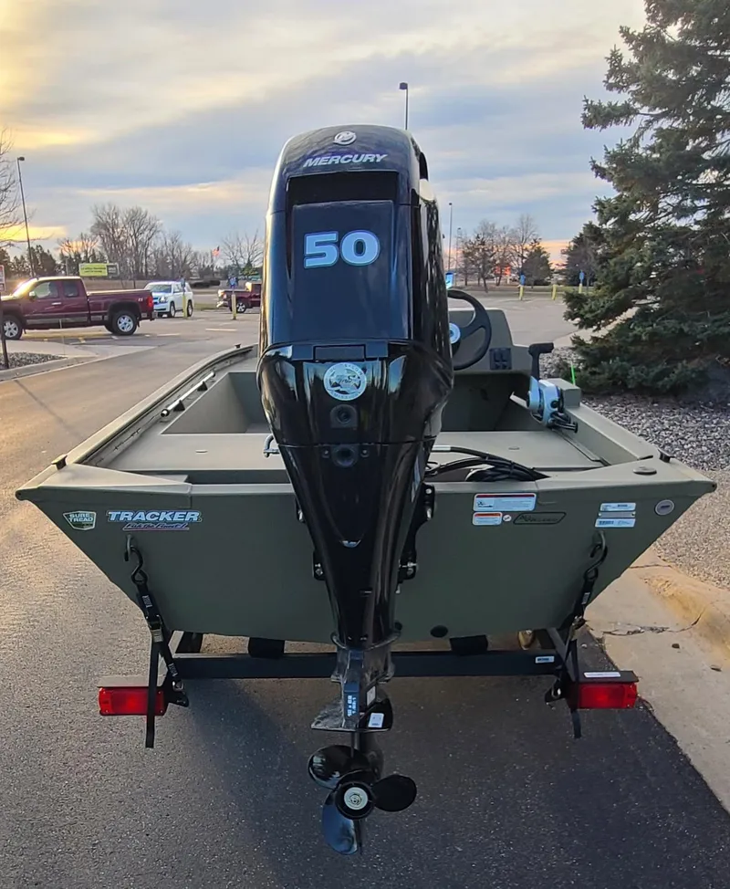 Slide: The Image of 2024 Tracker Grizzly 1648 SC boat with Mercury 50 HP outboard motor. - 3