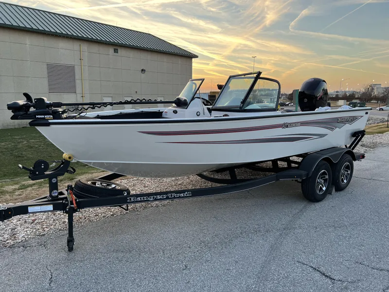 Slide: The Image of 2024 Ranger VS1882SC Angler boat on a trailer, side view. - 2