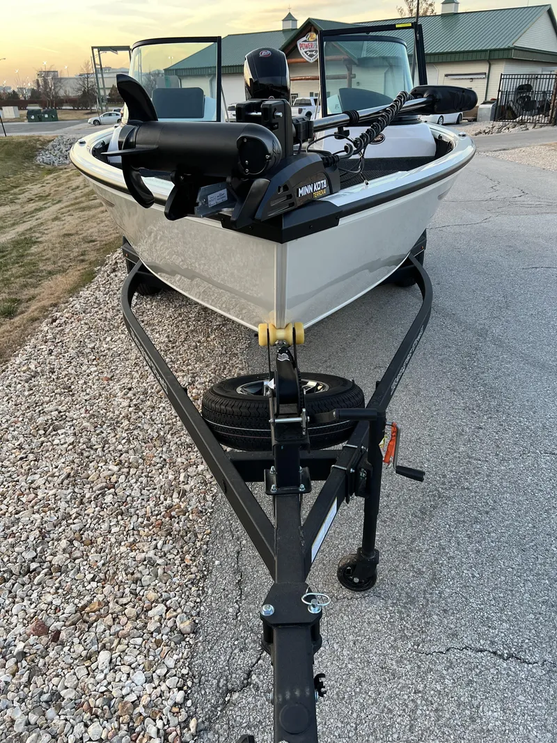 Slide: The Image of 2024 Ranger VS1882SC Angler boat on a trailer at sunset. - 3