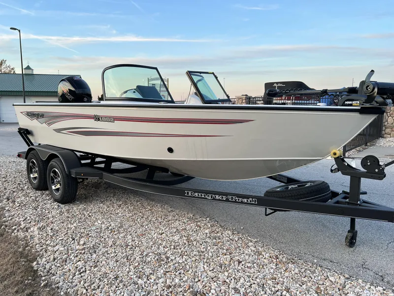 Slide: The Image of 2024 Ranger VS1882SC Angler boat on a trailer, parked outdoors. - 4