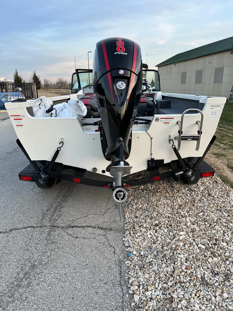Slide: The Image of 2024 Ranger VS1882SC Angler boat interior with steering console and seating. - 7
