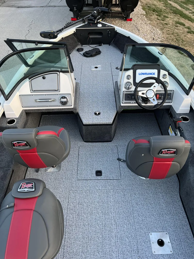 Slide: The Image of 2024 Ranger VS1882SC Angler boat interior with dual seats and windshield. - 9
