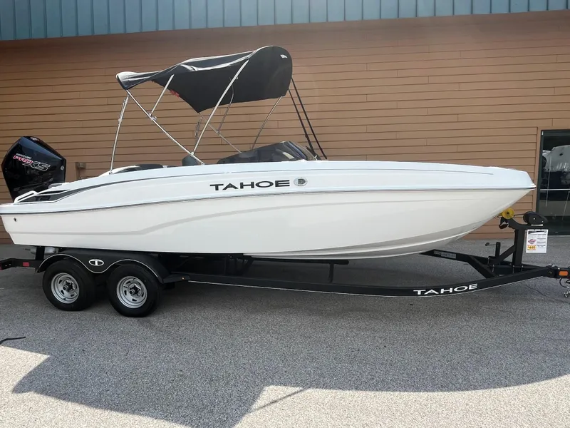 The Image of 2024 Tahoe T21 boat on trailer with canopy. - 0