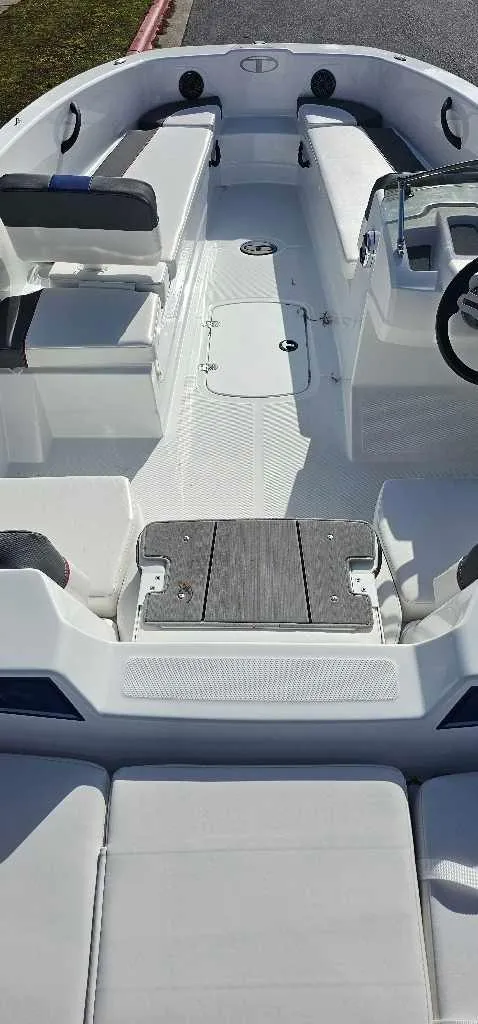 Slide: The Image of 2024 Tahoe T18 boat interior with seating and steering wheel. - 3
