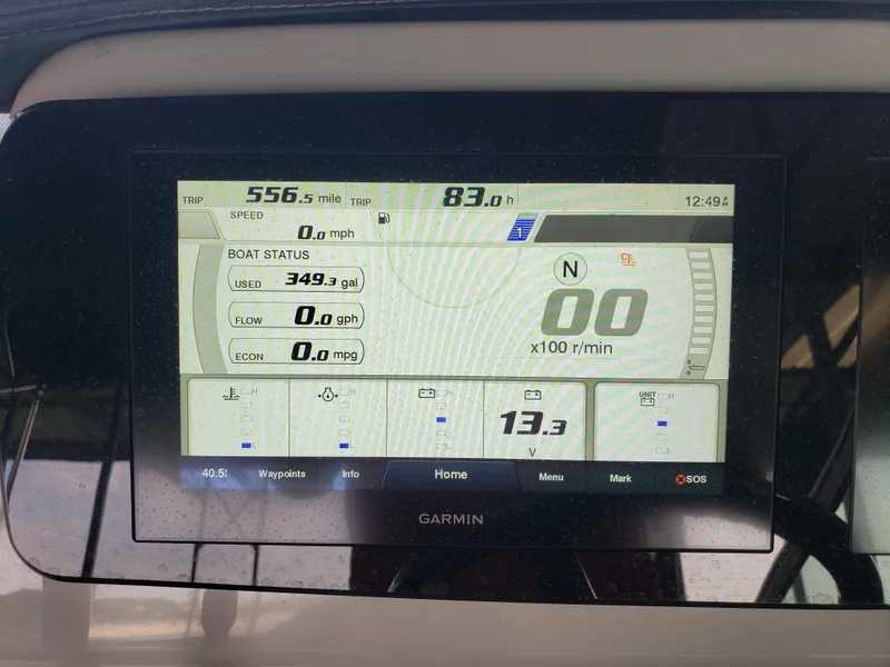 Slide: The Image of Garmin display on 2022 Regal 26XO boat showing trip and fuel data. - 10
