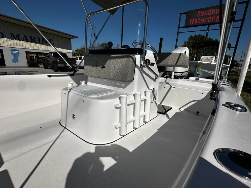 Slide: The Image of 2024 Sea Pro 172 Bay boat interior with seating and steering console. - 12