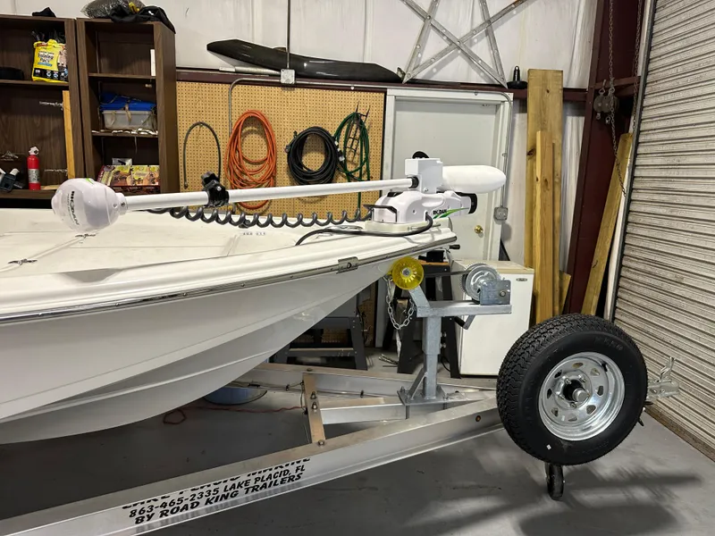 Slide: The Image of 2024 Sea Pro 172 Bay boat on a trailer in a garage. - 13