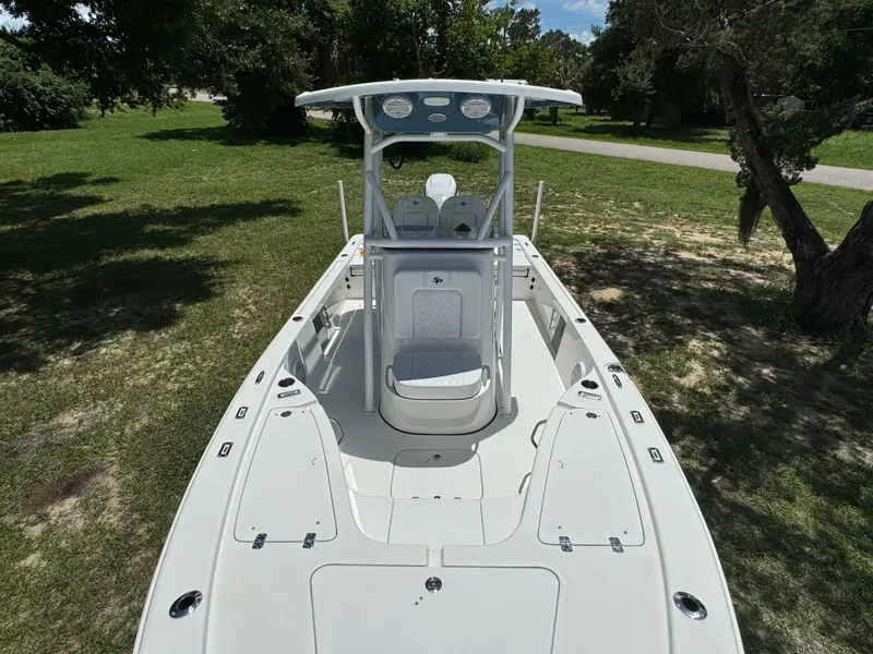 Slide: The Image of 2024 Sea Pro 230 Bay boat with center console and spacious deck. - 16