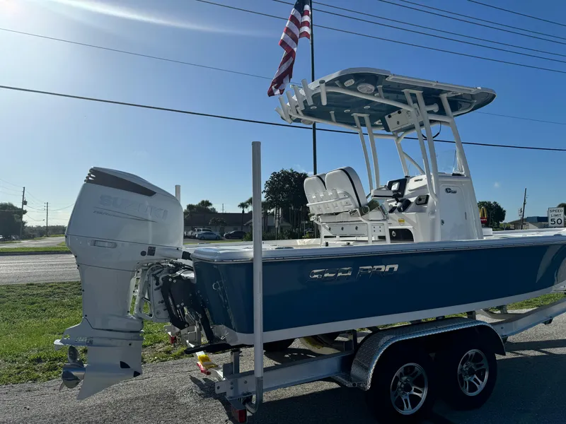 Slide: The Image of 2024 Sea Pro 230 Bay boat on trailer with outboard motor. - 47