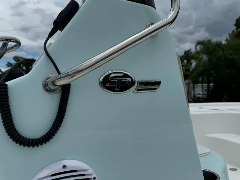 Slide: The Image of Close-up of 2024 Sea Pro 210 Bay boat console with logo. - 21