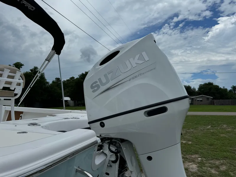 Slide: The Image of 2024 Sea Pro 210 Bay boat with Suzuki outboard motor. - 37