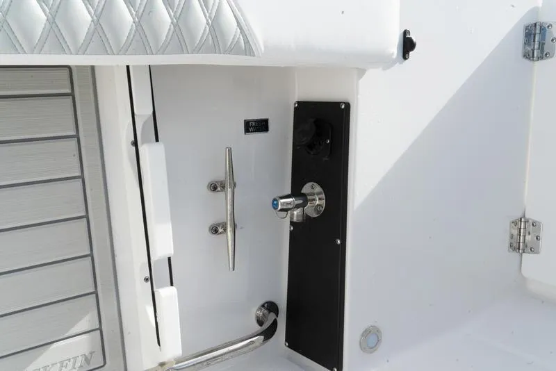 Slide: The Image of 2024 Blackfin 272 DC boat interior detail with sleek design and modern fittings. - 10