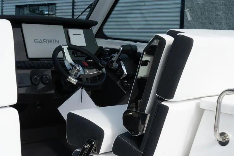 Slide: The Image of 2024 Blackfin 272 DC boat interior with Garmin navigation system. - 14