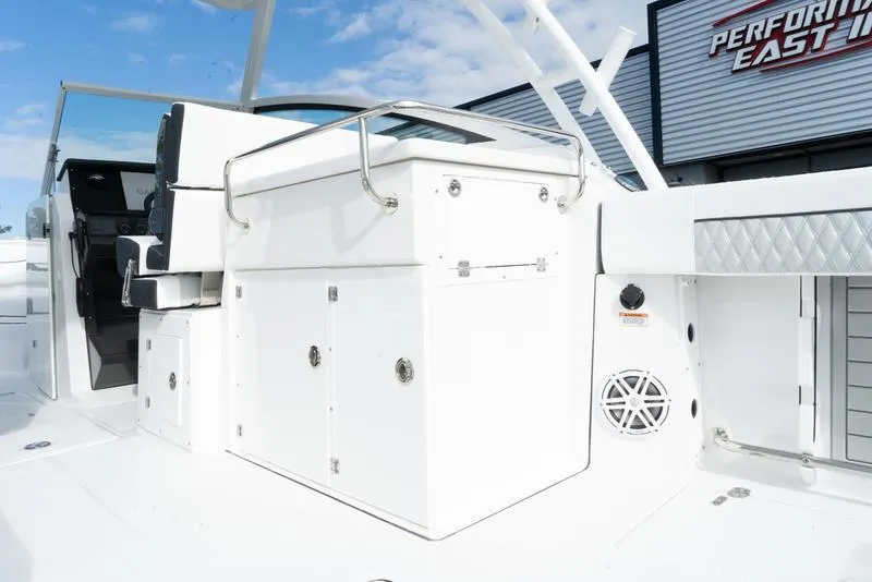 Slide: The Image of 2024 Blackfin 272 DC boat interior with seating and storage compartments. - 8