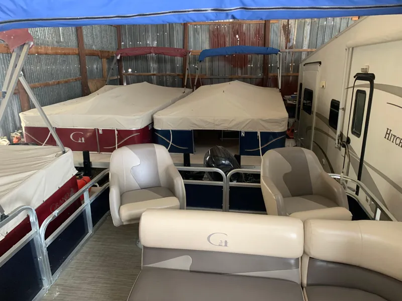 Slide: The Image of Covered tour boats and business setup in a storage facility, Custom model, 1987. - 20