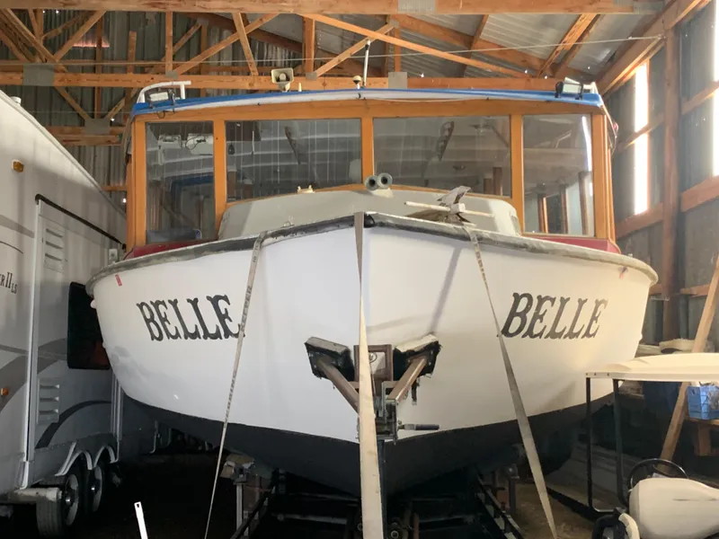 Slide: The Image of 1987 Custom tour boat Belle in storage shed. - 23