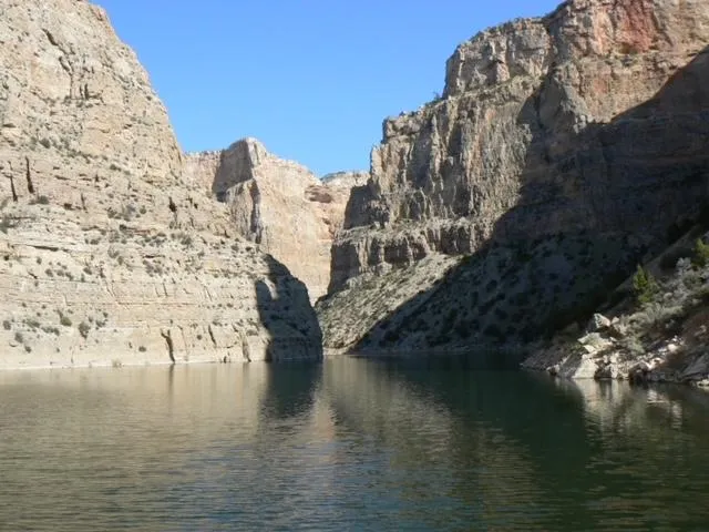 Slide: The Image of Scenic canyon view with calm river and rugged cliffs, perfect for 1987 custom tour boat business. - 27