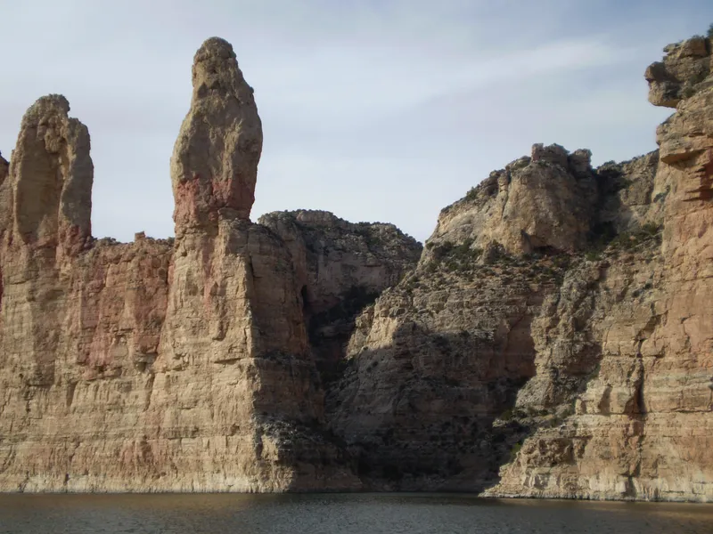 Slide: The Image of Rock formations by the water, Custom Tour Boat and Business, 1987. - 28