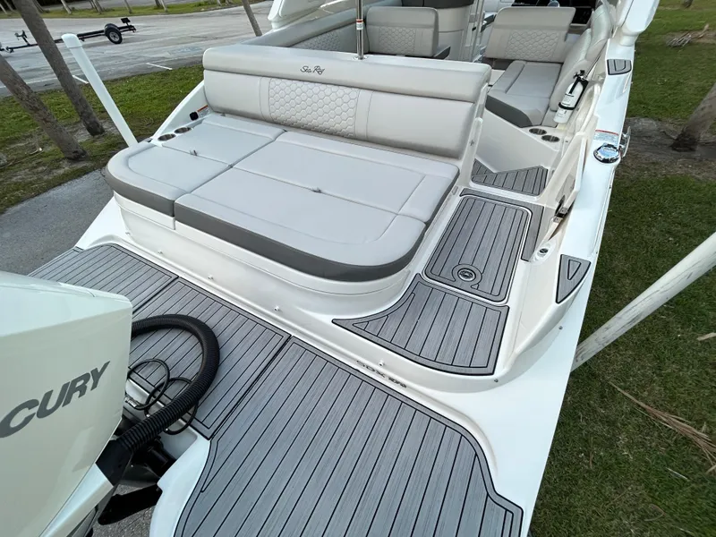 Slide: The Image of 2022 Sea Ray SDX 270 Outboard boat with spacious seating and modern design. - 11