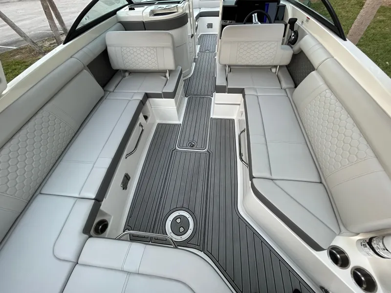 Slide: The Image of 2022 Sea Ray SDX 270 Outboard interior with spacious seating and modern design. - 18