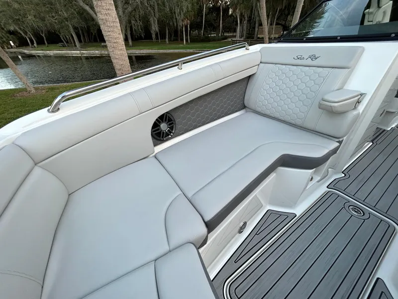 Slide: The Image of 2022 Sea Ray SDX 270 Outboard boat interior with luxurious seating and modern design. - 32