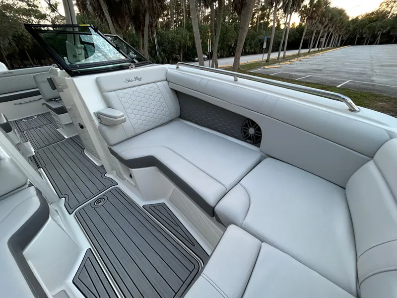 Slide: The Image of 2022 Sea Ray SDX 270 Outboard boat interior with luxurious seating and modern design. - 33