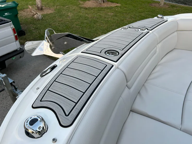 Slide: The Image of 2022 Sea Ray SDX 270 Outboard boat with cushioned seating and deck. - 34