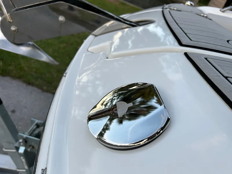 Slide: The Image of 2022 Sea Ray SDX 270 Outboard boat deck with chrome details. - 36