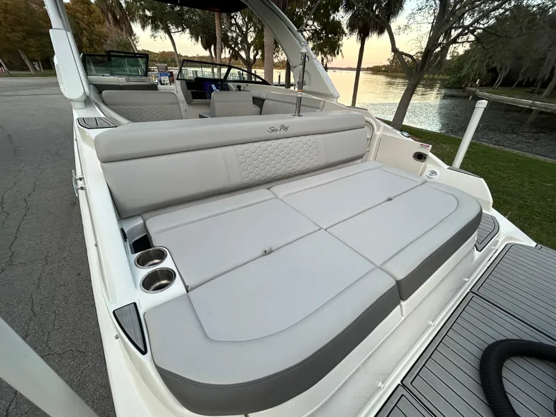 Slide: The Image of 2022 Sea Ray SDX 270 Outboard boat with spacious seating and cup holders. - 40