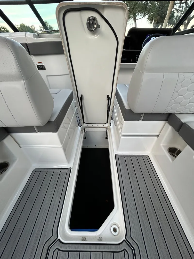 Slide: The Image of 2022 Sea Ray SDX 270 Outboard boat interior storage compartment. - 49