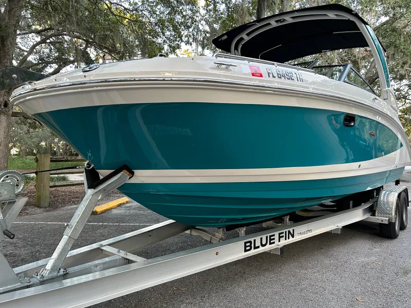 Slide: The Image of 2022 Sea Ray SDX 270 Outboard boat on Blue Fin trailer. - 7
