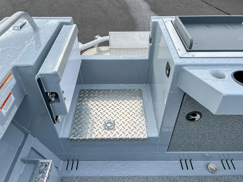 Slide: The Image of 2025 Hewescraft 210 Sea Runner ET boat interior with diamond plate flooring. - 18