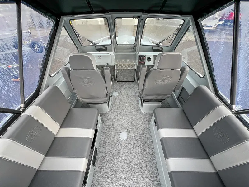 Slide: The Image of Interior of 2025 Hewescraft 210 Sea Runner ET, featuring spacious seating and modern design. - 7