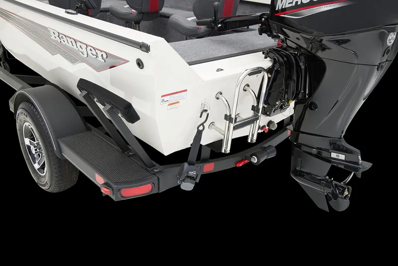 Slide: The Image of 2024 Ranger VS1665T boat interior with Mercury engine, featuring seating and control panel. - 10