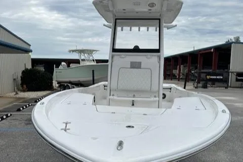 Slide: The Image of 2024 Sea Fox 231 Bay Fox boat docked at a marina. - 10