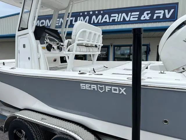 Slide: The Image of 2024 Sea Fox 231 Bay Fox boat at Momentum Marine & RV dealership. - 2