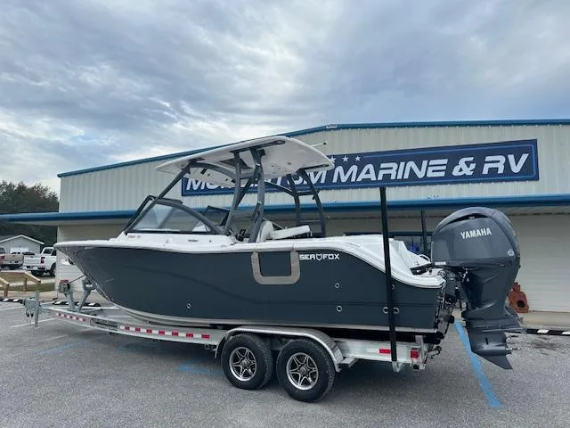 The Image of 2024 Sea Fox 268 Traveler boat on trailer at Marine & RV dealership. - 1