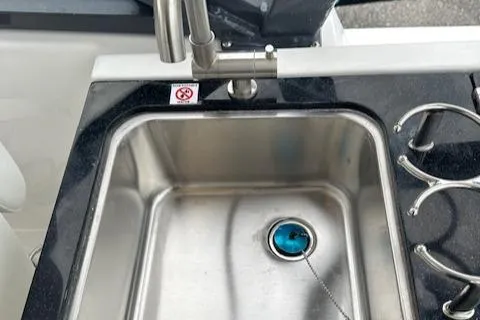Slide: The Image of Stainless steel sink and faucet on 2024 Sea Fox 268 Traveler boat. - 15