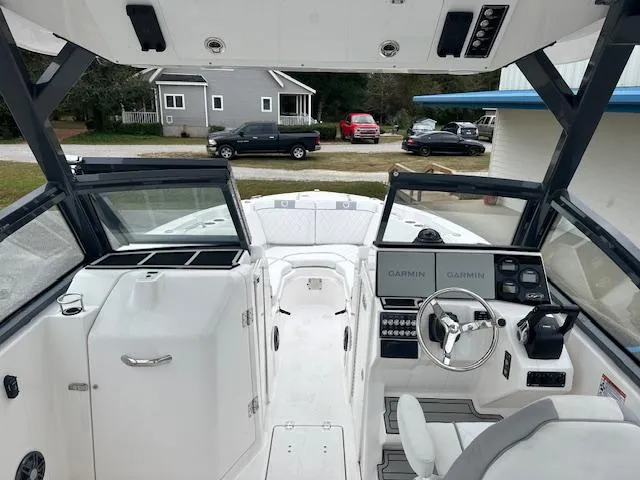 Slide: The Image of 2024 Sea Fox 268 Traveler boat interior with Garmin navigation system and modern controls. - 5