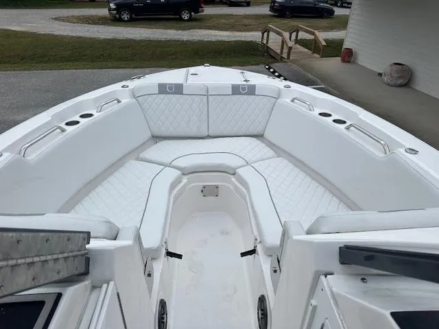 Slide: The Image of 2024 Sea Fox 268 Traveler boat with spacious white seating area. - 8